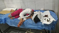 Дети получившие осколочные ранения при обстреле жилого квартала Алеппо. 6 мая 2018 Дети получившие осколочные ранения при обстреле жилого квартала Алеппо. 6 мая 2018