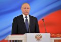 Избранный президент РФ Владимир Путин во время церемонии инаугурации в Кремле. 7 мая 2018 Избранный президент РФ Владимир Путин во время церемонии инаугурации в Кремле. 7 мая 2018