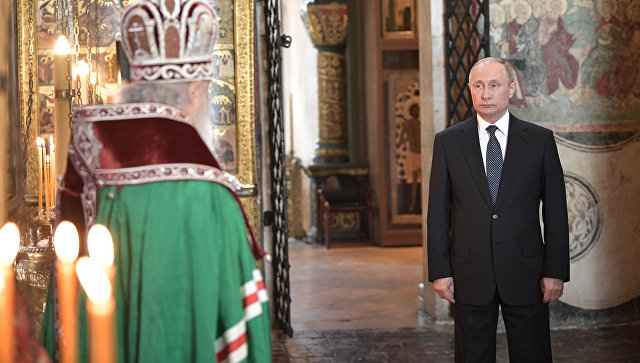 Президент РФ Владимир Путин и патриарх Московский и всея Руси Кирилл во время благодарственного молебна по случаю инаугурации. 7 мая 2018
