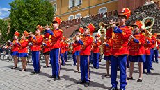 Участники фестиваля детских духовых оркестров Спасская башня детям. Архивное фото Участники фестиваля детских духовых оркестров Спасская башня детям. Архивное фото