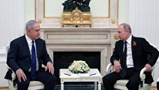 9 мая 2018. Президент РФ Владимир Путин и премьер-министр государства Израиль Биньямин Нетаньяху. Архивное фото 9 мая 2018. Президент РФ Владимир Путин и премьер-министр государства Израиль Биньямин Нетаньяху. Архивное фото