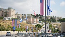 Флаги США и Израиля в Иерусалиме, где состоялась церемония переноса посольства США из Тель-Авива в Иерусалим. Архивное фото Флаги США и Израиля в Иерусалиме, где состоялась церемония переноса посольства США из Тель-Авива в Иерусалим. Архивное фото