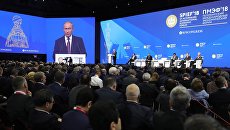 Президент РФ Владимир Путин выступает на пленарном заседании Петербургского международного экономического форума. 25 мая 2018 Президент РФ Владимир Путин выступает на пленарном заседании Петербургского международного экономического форума. 25 мая 2018