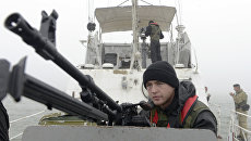 Сотрудники береговой охраны Украины патрулируют Азовское море в районе Мариуполя Сотрудники береговой охраны Украины патрулируют Азовское море в районе Мариуполя