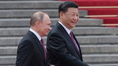 Президент РФ Владимир Путин и председатель КНР Си Цзиньпин. Архивное фото Президент РФ Владимир Путин и председатель КНР Си Цзиньпин. Архивное фото
