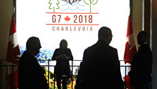 Логотип саммита G7 в Квебеке, Канада. Архивное фото Логотип саммита G7 в Квебеке, Канада. Архивное фото