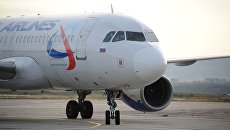 Самолёт авиакомпании Уральские авиалинии. Архивное фото Самолёт авиакомпании Уральские авиалинии. Архивное фото