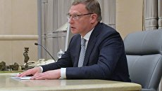 ВРИО Омской области Александр Бурков во время встречи с Дмитрием Медведевым. 19 июля 2018 ВРИО Омской области Александр Бурков во время встречи с Дмитрием Медведевым. 19 июля 2018