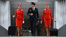 Бортпроводники авиакомпании Аэрофлот. Архивное фото Бортпроводники авиакомпании Аэрофлот. Архивное фото