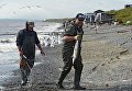 Рыбак с уловом на побережье Беренгова моря Рыбак с уловом на побережье Беренгова моря