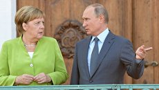 Президент РФ Владимир Путин и федеральный канцлер ФРГ Ангела Меркель во время встречи в резиденции правительства ФРГ Мезеберг. 18 августа 2018 Президент РФ Владимир Путин и федеральный канцлер ФРГ Ангела Меркель во время встречи в резиденции правительства ФРГ Мезеберг. 18 августа 2018
