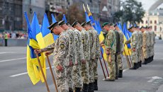 Военнослужащие на репетиции военного парада в честь 27-ой годовщины Независимости Украины в центре Киева Военнослужащие на репетиции военного парада в честь 27-ой годовщины Независимости Украины в центре Киева