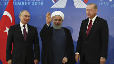Президент России Владимир Путин, Иран Хасан Рухани и Турции Реджеп Тайип Эрдоган во время встречи в Тегеране. 7 сентября 2018 Президент России Владимир Путин, Иран Хасан Рухани и Турции Реджеп Тайип Эрдоган во время встречи в Тегеране. 7 сентября 2018