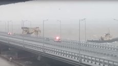 Столкновение плавучего крана с Крымским мостом Столкновение плавучего крана с Крымским мостом