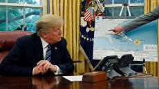 Президент США Дональд Трамп во время совещания по подготовке к урагану Флоренс Президент США Дональд Трамп во время совещания по подготовке к урагану Флоренс