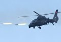 Ударный вертолет Z-19 армии КНР на забайкальском полигоне Цугол, где проходит основной этап военных маневров Восток-2018 Ударный вертолет Z-19 армии КНР на забайкальском полигоне Цугол, где проходит основной этап военных маневров Восток-2018