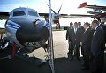 Президент РФ Владимир Путин осматривает самолеты L-410 УВП-Е20 во время посещения военно-патриотического парка Патриот Президент РФ Владимир Путин осматривает самолеты L-410 УВП-Е20 во время посещения военно-патриотического парка Патриот