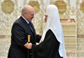 Президент Белоруссии Александр Лукашенко и патриарх Московский и всея Руси Кирилл во время встречи в Минске Президент Белоруссии Александр Лукашенко и патриарх Московский и всея Руси Кирилл во время встречи в Минске