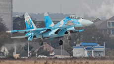 Истребитель Су-27 ВВС Украины во время многонациональных учений Чистое небо-2018 в Хмельницкой области. Архивное фото Истребитель Су-27 ВВС Украины во время многонациональных учений Чистое небо-2018 в Хмельницкой области. Архивное фото