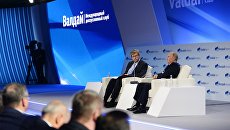 Президент РФ Владимир Путин на заседании клуба Валдай в Сочи. 18 октября 2018 Президент РФ Владимир Путин на заседании клуба Валдай в Сочи. 18 октября 2018