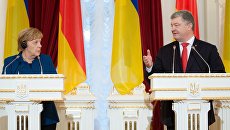 Президент Украины Петр Порошенко и канцлер Германии Ангела Меркель во время встречи. 1 ноября 2018 Президент Украины Петр Порошенко и канцлер Германии Ангела Меркель во время встречи. 1 ноября 2018