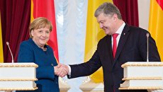Президент Украины Петр Порошенко и канцлер Германии Ангела Меркель во время встречи. 1 ноября 2018 Президент Украины Петр Порошенко и канцлер Германии Ангела Меркель во время встречи. 1 ноября 2018