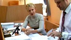 Тимошенко в суде поблагодарила своих сторонников за их молитвы Тимошенко в суде поблагодарила своих сторонников за их молитвы