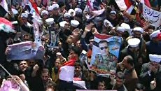 Сирийцы вышли на многотысячный митинг в поддержку президента Асада Сирийцы вышли на многотысячный митинг в поддержку президента Асада