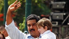Кандидат на пост президента Венесуэлы Николас Мадуро и его жена Силия Флорес Кандидат на пост президента Венесуэлы Николас Мадуро и его жена Силия Флорес