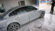 Автомойка. Архивное фото Автомойка. Архивное фото