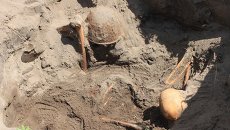 Перезахоронение останков советских солдат. Архивное фото Перезахоронение останков советских солдат. Архивное фото