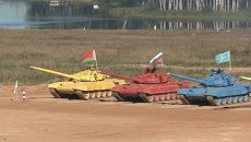 Танковый биатлон, или Гонки на разноцветных Т-72Б через брод и минное поле Танковый биатлон, или Гонки на разноцветных Т-72Б через брод и минное поле