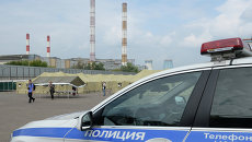Автомобиль сотрудников правоохранительных органов. Архивное фото Автомобиль сотрудников правоохранительных органов. Архивное фото