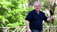 Актер Филип Сеймур Хоффман во время фотосессии, посвященной фильму Миссия: невыполнима 3, 2006 Актер Филип Сеймур Хоффман во время фотосессии, посвященной фильму Миссия: невыполнима 3, 2006