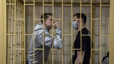Подсудимые по делу приморских партизан Владимир Илютиков и Роман Савченко. Архивное фото Подсудимые по делу приморских партизан Владимир Илютиков и Роман Савченко. Архивное фото